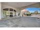 Residential building entrance with covered area and benches at 5105 Kingsbridge Dr, Las Vegas, NV 89130