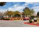 Community clubhouse with landscaping and parking at 5105 Kingsbridge Dr, Las Vegas, NV 89130