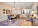 Dining area with hardwood floors and a view into the kitchen at 5105 Kingsbridge Dr, Las Vegas, NV 89130