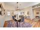 Lovely dining area with modern light fixture, view of kitchen, and stylish decor at 5105 Kingsbridge Dr, Las Vegas, NV 89130