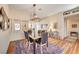 Elegant dining room with hardwood floors and a stylish chandelier at 5105 Kingsbridge Dr, Las Vegas, NV 89130