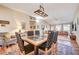 Bright dining area with a view of the living room and backyard at 5105 Kingsbridge Dr, Las Vegas, NV 89130