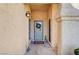 Inviting entryway with a light teal door and decorative bunny statues at 5105 Kingsbridge Dr, Las Vegas, NV 89130