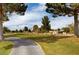 Landscaped golf course with paved pathway at 5105 Kingsbridge Dr, Las Vegas, NV 89130
