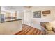 Open-concept kitchen featuring stainless steel appliances and hardwood floors at 5105 Kingsbridge Dr, Las Vegas, NV 89130