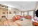 Bright living room featuring comfortable sofas, natural light, and an open layout at 5105 Kingsbridge Dr, Las Vegas, NV 89130