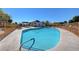 Community pool with a relaxing patio area at 5105 Kingsbridge Dr, Las Vegas, NV 89130