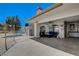 Relaxing pool area with lounge chairs and covered seating at 5105 Kingsbridge Dr, Las Vegas, NV 89130
