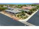 Aerial view of the home featuring solar panels, meticulous landscaping, and neighborhood views at 6425 Orto Botanico Ct, Las Vegas, NV 89131