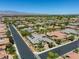 Beautiful aerial view of a neighborhood featuring mountain views in the distance at 6425 Orto Botanico Ct, Las Vegas, NV 89131