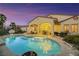 Backyard oasis featuring a sparkling pool, spa, and covered patio perfect for entertaining at 6425 Orto Botanico Ct, Las Vegas, NV 89131