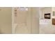 Spacious bathroom with a walk-in shower, adjacent to a soaking tub at 6425 Orto Botanico Ct, Las Vegas, NV 89131