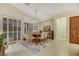 Inviting dining room with ample natural light and easy access to kitchen at 6425 Orto Botanico Ct, Las Vegas, NV 89131