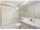 Bathroom with tub and single sink at 6914 Emerald Springs Ln, Las Vegas, NV 89113