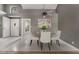 Dining area with tile floors, bright lighting, and views through the doorway at 6914 Emerald Springs Ln, Las Vegas, NV 89113