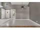 Bright entryway featuring white tile flooring and access to multiple rooms in the home at 6914 Emerald Springs Ln, Las Vegas, NV 89113
