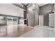 Spacious living area with hardwood and tile flooring, and plenty of natural light at 6914 Emerald Springs Ln, Las Vegas, NV 89113