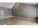 Spacious room with vaulted ceilings, ceiling fan, and modern flooring; ideal for relaxation at 6914 Emerald Springs Ln, Las Vegas, NV 89113