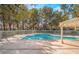 Inviting community pool area with a refreshing swimming pool and shaded lounging spots at 6914 Emerald Springs Ln, Las Vegas, NV 89113