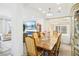 Elegant dining room with hardwood floors and chandelier at 7646 Sandhaven St, Las Vegas, NV 89139