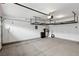 Garage interior with overhead storage racks at 7646 Sandhaven St, Las Vegas, NV 89139