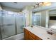 Bathroom with a double vanity and a shower at 8063 Sundance Valley Dr, Las Vegas, NV 89178