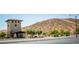 Exterior image of the community entrance with beautiful drought resistant landscaping at 8063 Sundance Valley Dr, Las Vegas, NV 89178