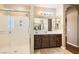 Large bathroom with walk-in shower and double vanity at 8109 Mountain Forest Ct, Las Vegas, NV 89129