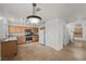 Modern kitchen with light wood cabinets and stainless steel appliances at 8388 Montgomery St, Las Vegas, NV 89123