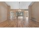 Bright dining room with a chandelier and wood floors at 9917 Arbuckle Dr, Las Vegas, NV 89134