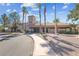 Fitness center with a clock tower and palm trees at 9917 Arbuckle Dr, Las Vegas, NV 89134