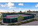 Well-maintained tennis courts with surrounding fencing and lighting at 9917 Arbuckle Dr, Las Vegas, NV 89134