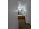 Hallway view of bathroom featuring double sink vanity at 10524 Pine Gardens Ct # 203, Las Vegas, NV 89144