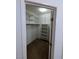 Walk-in closet with shelves at 10524 Pine Gardens Ct # 203, Las Vegas, NV 89144
