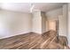 Bright bedroom featuring beautiful floors, a ceiling fan, and high ceilings at 10649 Bella Ordaz Way, Las Vegas, NV 89141