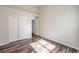 Bedroom with closet featuring beautiful floors and ample natural light at 10649 Bella Ordaz Way, Las Vegas, NV 89141