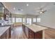 Spacious kitchen features stainless steel appliances, an island with a sink, and ample cabinet space at 10649 Bella Ordaz Way, Las Vegas, NV 89141