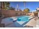 Sparkling backyard pool and spa combo surrounded by a private, walled-in garden at 10649 Bella Ordaz Way, Las Vegas, NV 89141