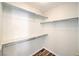 Spacious walk-in closet features custom shelving for optimal storage at 10649 Bella Ordaz Way, Las Vegas, NV 89141