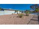 Single-story home featuring low-maintenance desert landscaping and fencing at 1634 Serenada Ave, Las Vegas, NV 89169