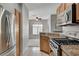 Modern kitchen with stainless steel appliances and stone countertops, offering seamless living transition at 1700 Hills Of Red Dr # 202, Las Vegas, NV 89128