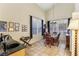 Bright dining area with tile floors, natural light, and adjacent kitchen counter with a sink at 198 Adomeit Dr, Henderson, NV 89074