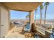 Private balcony with seating and a view of the surrounding area at 2173 Aspen Mirror Way # 101, Laughlin, NV 89029
