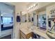 Double vanity bathroom with a view of bedroom at 2173 Aspen Mirror Way # 101, Laughlin, NV 89029