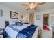 Bright bedroom with a queen bed, and access to the bathroom at 2173 Aspen Mirror Way # 101, Laughlin, NV 89029