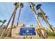 Colorado Bay Club entrance with palm trees and signage at 2173 Aspen Mirror Way # 101, Laughlin, NV 89029