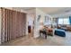 Laundry area with curtain and wood-look flooring at 2173 Aspen Mirror Way # 101, Laughlin, NV 89029
