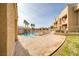 Inviting community pool with a surrounding patio area at 2173 Aspen Mirror Way # 101, Laughlin, NV 89029