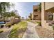 Well-maintained walkway leading to the community pool at 2173 Aspen Mirror Way # 101, Laughlin, NV 89029