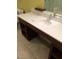 Modern bathroom vanity with single sink, wood cabinets, and quartz countertop at 29 Montelago Blvd # 309, Henderson, NV 89011